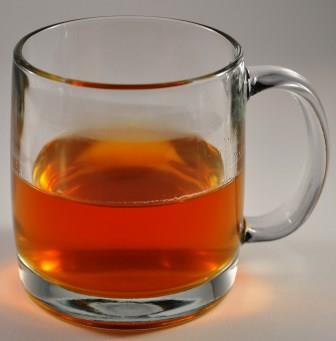 Black Tea vs Green Tea - Infused Black Tea In A Glass Mug