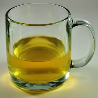 Black Tea vs Green Tea - Infused Green Tea In A Glass Mug