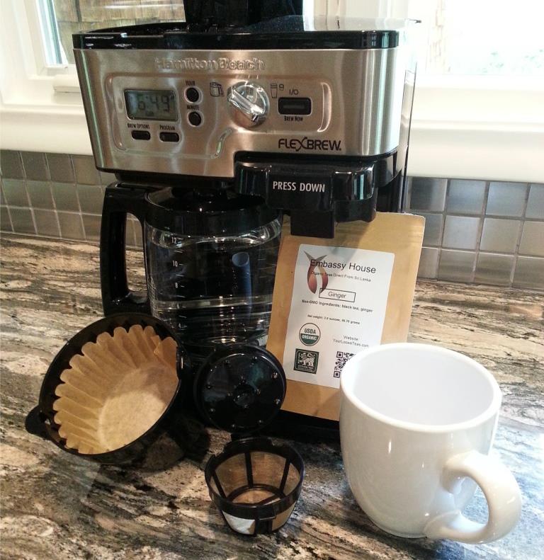 How to brew loose tea using a drip coffee maker.  Items displayed drip coffee maker, tea, mug, individual and pot filters.